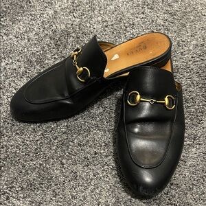 Gucci Black Leather Slip-On Loafers with Gold Accents